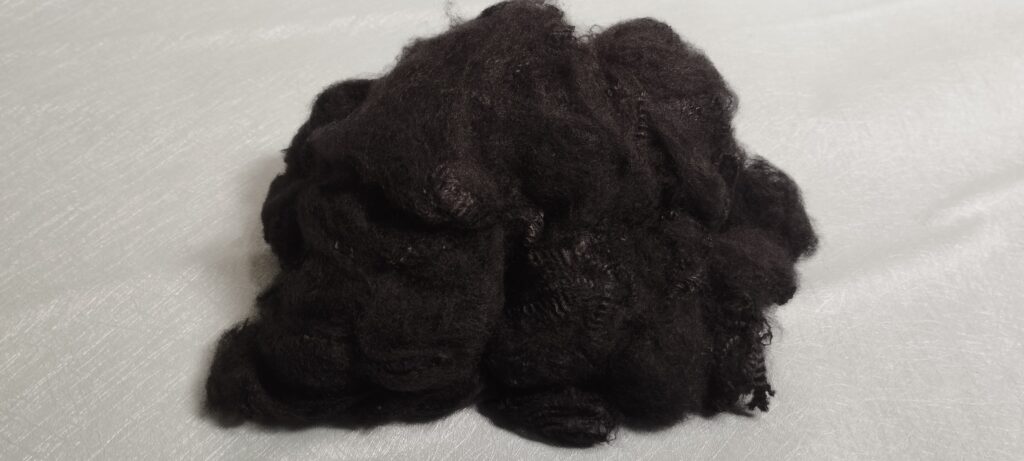 Recycled polyester staple fiber raw materials for automotive textile manufacturing